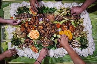 <span class="mw-page-title-main">Kamayan</span> Filipino folkway for eating a communal meal