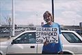 Person Holding Sign