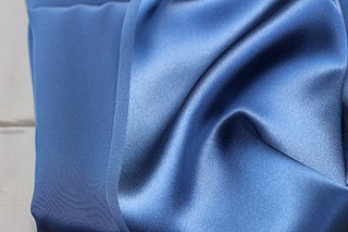 <span class="mw-page-title-main">Charmeuse</span> Lightweight woven fabric with a satin face and dull back