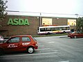 A bus outside the Asda Supermarket at Holt Park