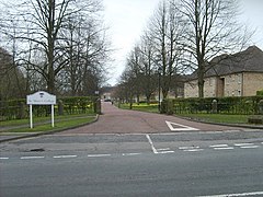 Sign for the entrance of the College on Quarryheads lane.