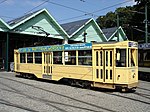 Motorwagen 5001 als museumtram, uitgerust met een pantograaf voor stadsrondritten. Deze grote vierassers werden speciaal gebouwd voor de Brusselse Wereldtentoonstelling.