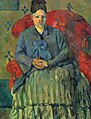 『赤い肘掛け椅子のセザンヌ夫人』1877年頃。72.5×56cm。ボストン美術館。