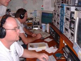 A multioperator contest effort involves a team of operators at one station. Contesting-multioperator.JPG