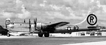 Enola Gay after Hiroshima mission, entering hardstand. It is in its 6th Bombardment Group livery, with victor number 82 visible on fuselage just forward of the tail fin. Enola Gay (plane).jpg