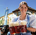 Image 3A waitress from the Hacker-Pschorr brewery carries beer mugs during the Oktoberfest  5 in Munich  4, Germany  3 (2011)