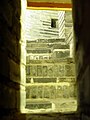 Internal spiral staircase seen through window from outside