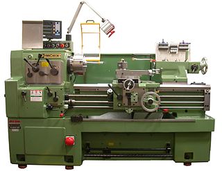 <span class="mw-page-title-main">Metal lathe</span> Machine tool used to remove material from a rotating workpiece