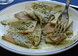 A plate of testaroli, an ancient dish, served with pesto at a trattoria in Pontremoli, Italy Testaroli-Pesto-Pontremoli-2800.jpg