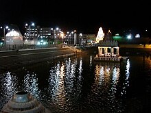 Swami Pushkarni during night with Mandapam at its centre and Venkateswara Temple in the background SwamiPushkarni.JPG