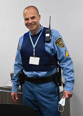 <span class="mw-page-title-main">Security guard</span> Person employed to protect properties or people