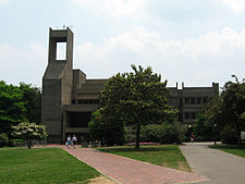 Facade of Lauinger Library at middle distance, from the front of Healy Hall.