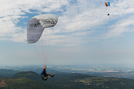 Paraglider on the puy de Dôme, France.