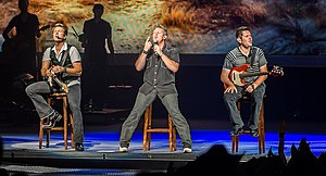 Country music group Rascal Flatts performing onstage.