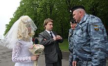 Nikolai Alekseev at the Slavic Pride festival on 16 May 2009--two anti-riot police stopped Alekseev and his partner, a transgender activist from Belarus SlavicPride2009NikolaiAlekseevOMON.jpg