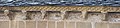 Modillions carved with animal heads in the Abbaye Ste Foy in Conques (France).