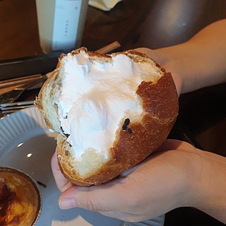 <span class="mw-page-title-main">Cream bun</span> Sweet bun with cream filling