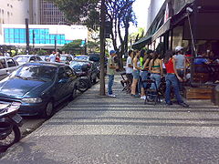 Sidewalk next to Paulista Avenue tiled with Portuguese pavement, in São Paulo, Brazil