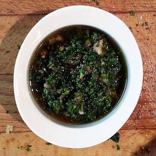 <span class="mw-page-title-main">Chimichurri</span> Uncooked sauce for meat