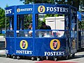 A stand selling Foster's Lager, F1's official beer