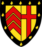 Clare College heraldic shield: The Clare coat of arms is divided into two equal parts. On the left hand side there are the three chevrons of the de Clare family. On the other side of the shield is the Cross, the symbol of the Christian roots of the College since its foundation.