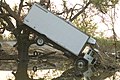 Truck on tree, flooded house, Empire, Louisiana