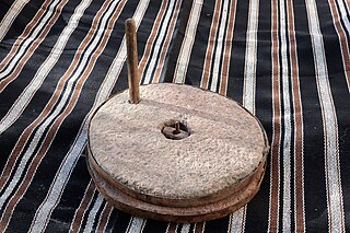 <span class="mw-page-title-main">Quern-stone</span> Stone tools for hand–grinding