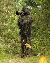 Wildlife Photographer in a ghillie suit