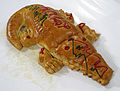 Image 55Roti buaya, crocodile-shaped bread is often served in festive occasions (from Jakarta)