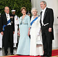 Elizabeth and Philip wearing the Garter star