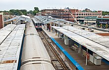 Howard station during reconstruction in August 2007. In the foreground are the wooden platforms and canopies dating from 1921; in the background new concrete platforms are under construction. Howard CTA 070818.jpg