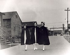 Laura Cobb, walking, center.