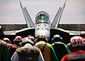 Flight deck personnel conduct a foreign object debris walk-down