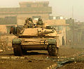 Soldiers from 3rd Armored Cavalry Regiment conduct security with their M1 Abrams Main Battle Tank for a cordon and search operation in Biaj, Iraq.