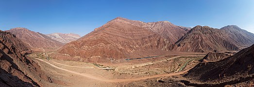 A RAI class 60 (EMD GT26CW-2) hauls the daily local train 218 Tehran - Sari through the canyon between Garmsar and Firooz Kooh