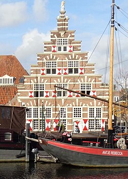 The former residence of Leiden's master carpenter at the Stadstimmwerwerf (city carpenter's or construction yard) with large stepped gable, open to the public and in use as art gallery.The former residence of the city's master carpenter at the Stadstimmerwerf (city carpenter's or construction yard), open to the public and in use as art gallery.