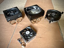 From left to right: Original AMD Wraith, Wraith Prism and Wraith Stealth. On the foreground is AMD's generic cooler for comparison. Notice the different mounting mechanism of Wraith Stealth which uses screw instead of bracket. Wraith family.jpg