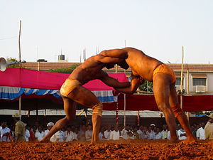 Pehlwani-style wrestling match in Davangere, Karnataka, India (2005).