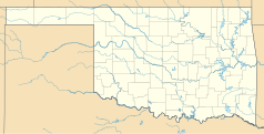 Mapa konturowa Oklahomy, u góry po prawej znajduje się punkt z opisem „Tulsa”