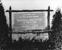 An early wooden sign for the National Cancer Institute Wooden sign.jpg