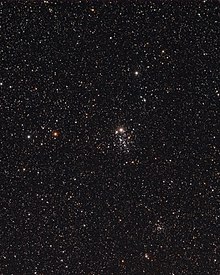 NGC 457 (center) pictured alongside open cluster NGC 436 (bottom right). NGC457-OwlCluster.jpg