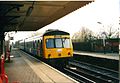 A former Strathclyde Public Transport train passing through Greater Manchester's Romiley Junction during 2003