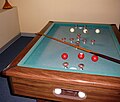 A rectangular bumper pool table