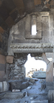 Entrance gate of the old church with a lintel decorated with acanthus leaves, and a dedicatory inscription. View from outside the church, from inside the gavit