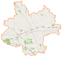 Mapa konturowa powiatu kolskiego, blisko centrum po lewej na dole znajduje się punkt z opisem „miejsce bitwy”