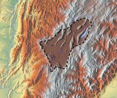 The flat Bogota savanna, the southern territory of the Muisca Confederation, not only provided fertile agricultural lands, but also many different clays for the production of ceramics, rock shelters where petroglyphs and petrographs were made and a central strategic access to the regions around it. This made trade with various neighbouring indigenous groups possible by which the Muisca obtained feathers, cotton, pigments and the vast amounts of gold and copper used for their fine tunjos, jewelry, and other golden and tumbaga artefacts Sabana de Bogota.png