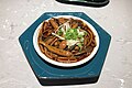 Stir-fried shredded eel with hot oil and ginger