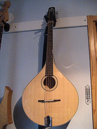 <span class="mw-page-title-main">Octave mandolin</span> Fretted string instrument