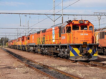 No. 34-694 in Spoornet orange with NLPI LOG emblems, Capital Park, 10 May 2013