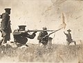 Loyalist soldiers in combat under machine gun fire.